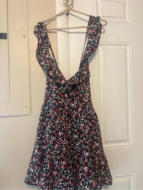 Floral Ruffle V-Back Romper — Black with Red & White Flowers